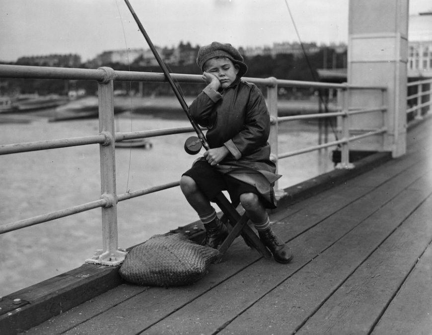 Kid falling asleep while fishing